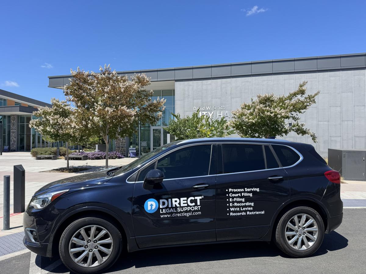 Direct Legal Support vehicle outside David W. Smith City Hall in Newark, California