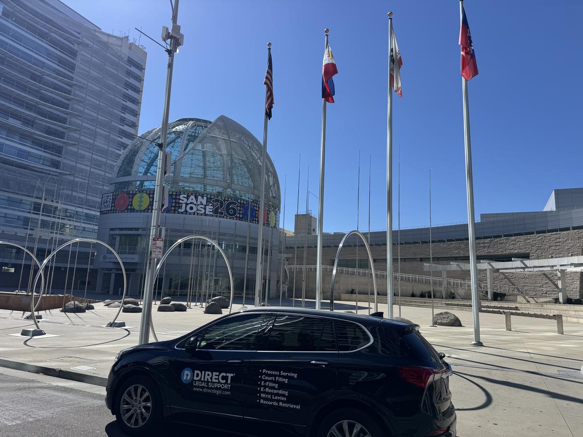 Direct Legal Support vehicle at San Jose City Hall on East Santa Clara Street