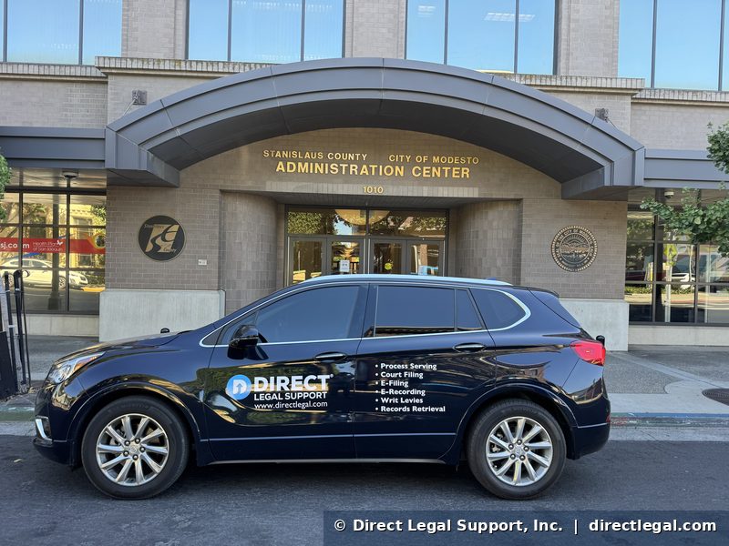 modesto-city-hall Direct Legal Support process server vehicle at Tenth Street Place, the joint City of Modesto and Stanislaus County Administration Center