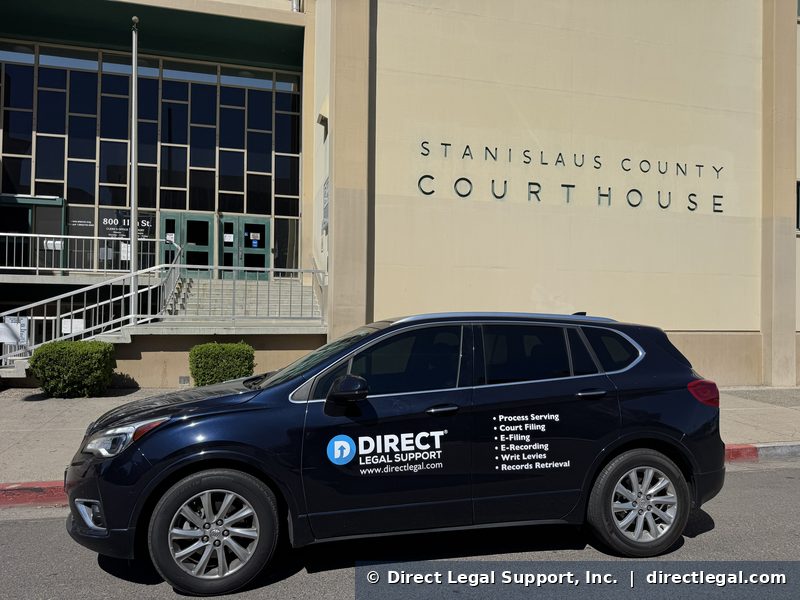 stanislaus-superior-court Direct Legal Support process server vehicle at the Stanislaus County Courthouse at 800 11th Street in Modesto